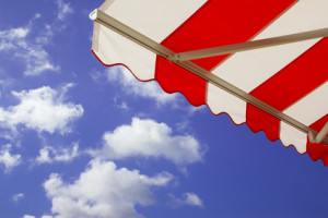 Awning over bright sunny blue sky